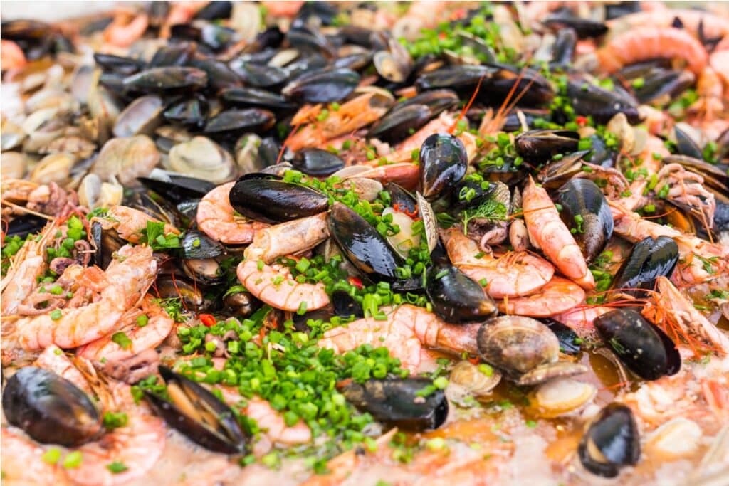 seafood paella with pink marine prawns and mussels 2023 11 27 05 16 42 utc