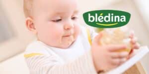 Bébé mange purée avec logo Blédina.