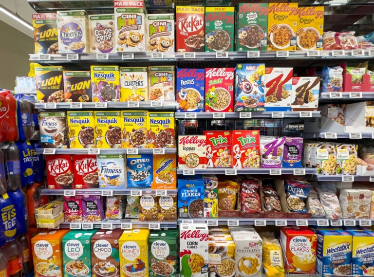 colorful supermarket cereal aisle display with various brands an